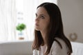 Pensive melancholic young woman thinking and looking away Royalty Free Stock Photo