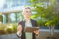 pensive modern woman employee near business center Royalty Free Stock Photo