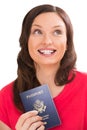 Pensive positive woman with a passport