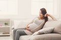 Pensive pregnant woman dreaming about child Royalty Free Stock Photo