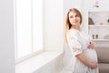 Pensive pregnant woman dreaming about child Royalty Free Stock Photo