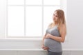 Pensive pregnant woman dreaming about child Royalty Free Stock Photo