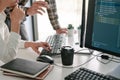 Pensive programmer working on desktop pc programming code technologies or website design at office Software Development Company