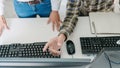 Pensive programmer working on desktop pc programming code technologies or website design at office Software Development Company Royalty Free Stock Photo