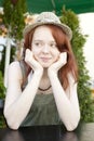 Pensive red hair woman wearing straw hat Royalty Free Stock Photo