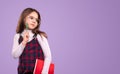 Pensive schoolgirl with pen and book Royalty Free Stock Photo