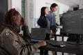 Pensive system engineer thinking at programming ideas trying to write html code Royalty Free Stock Photo