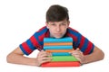 Pensive teenager boy with books Royalty Free Stock Photo