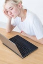 Pensive woman laptop writer block inspiration