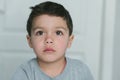 Pensive toddler boy thinking at home Royalty Free Stock Photo