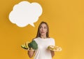 Pensive Woman Holding Plates With Healthy And Unhealthy Food, Counting Callories Royalty Free Stock Photo