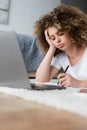 pensive woman writing in notebook near Royalty Free Stock Photo