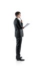 Pensive young businessman with document Royalty Free Stock Photo