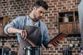 pensive young man cooking Royalty Free Stock Photo