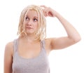 Pensive young woman with blonde dreadlocks Royalty Free Stock Photo