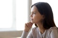 Pensive young woman look in distance thinking of future Royalty Free Stock Photo