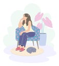 Pensive Young Woman Sitting in Armchair and Sleeping Cat