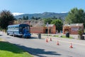 Shuttle bus parked outside Coyote Cruises Channel Float in summer