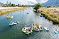 View of people floating down the Penticton River Channel in summer