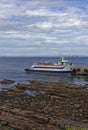 The Pentland Venture, the Passenger Ferry to the Orkneys moored up alongside the Pier of the harbour. Royalty Free Stock Photo