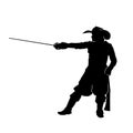 Silhouette of a man in musketeer costume holding sword weapon. Royalty Free Stock Photo