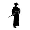 Silhouette of a samurai master. Silhouette of a male wearing kimono and holding a samurai sword.