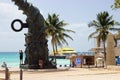 People, accessible beach, sculpture, ferry in Playa del Carmen, Mexico