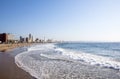 People on Addington Beach Against Durban City Skyline Royalty Free Stock Photo