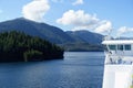 People admiring the beautiful blue ocean along the BC ferries inside passage route on the British Columbia coast , Canada.