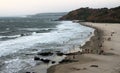 People admiring the sunset on the Vagator beach, Goa, India