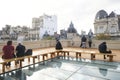 People admiring the view from the Cassara Building viewpoint, in Buenos Aires