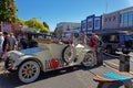 People admiring a vintage car at a show in Motueka High Street in front of the museum