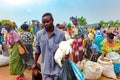 People on African market, typical vegetable, poultry and meat street market Uganda, Africa