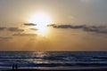 People against the background of the sea sunset