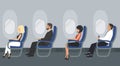 People in the aircraft cabin. Airline passengers are sitting in blue chairs