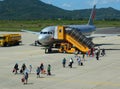 People and airplane on the runway at Lien Khang airport in Dalat, Vietnam Royalty Free Stock Photo