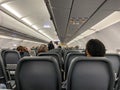 People on an airplane waiting for it to take off