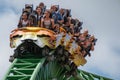 People amazing terrific Cheetah Hunt rollercoaster on lightblue cloudy sky background 51. Royalty Free Stock Photo