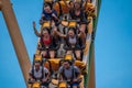 People amazing terrific Cheetah Hunt rollercoaster on lightblue cloudy sky background 88