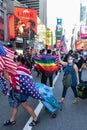 People with American Flags and Gay Pride Flags among Crowds in Times Square Celebrating after the Win of President Elect Joe Biden Royalty Free Stock Photo