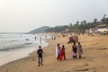People at Anjuna beach in Goa, India