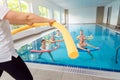 People in aqua fitness class during a physical therapy session Royalty Free Stock Photo