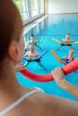 People in aqua fitness class during a physical therapy session Royalty Free Stock Photo