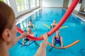 People in aqua fitness class during a physical therapy session