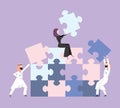 People in the Arab national dress collect puzzle. Business concept of teamwork and teambuilding. Vector illustration.