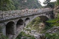 People on arched bridge in China Royalty Free Stock Photo