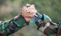 People, army and handshake for partnership, teamwork or deal in war, agreement or unity together in nature. Soldiers Royalty Free Stock Photo