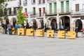 People around the big yellow letters of Caceres in the Plaza Mayor