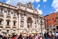 People around Trevi fountain in Rome, Italy