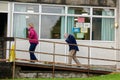 Glasgow, Scotland, UK, October 8th 2022, People arriving at covid 19 vaccination centre at start of roll out for the 3rd